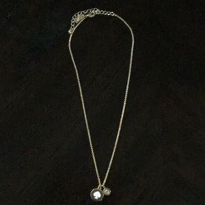 Kate Spade gold and white necklace.